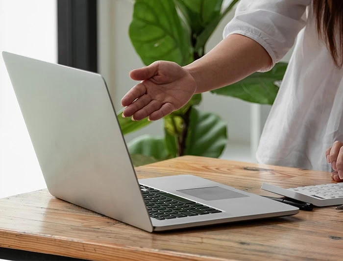 Women Pointing to Computer